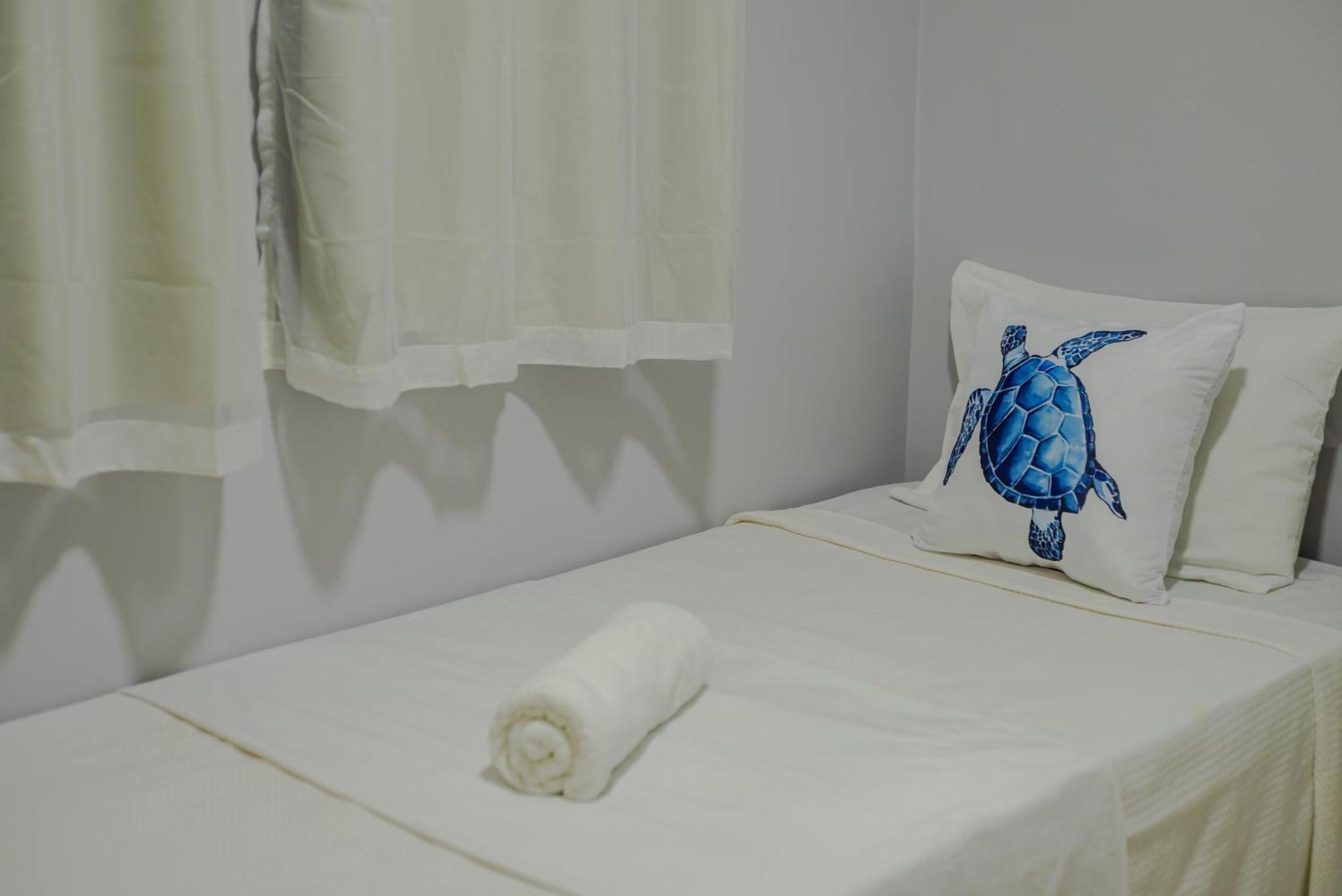 Holiday home 500M Praia De Taperapuan; 2 Quartos; Wifi 300Mbs; 2 Pavimento; Churrasqueira; Chuveirao; Estacionamento Gratuito 1 Carro *